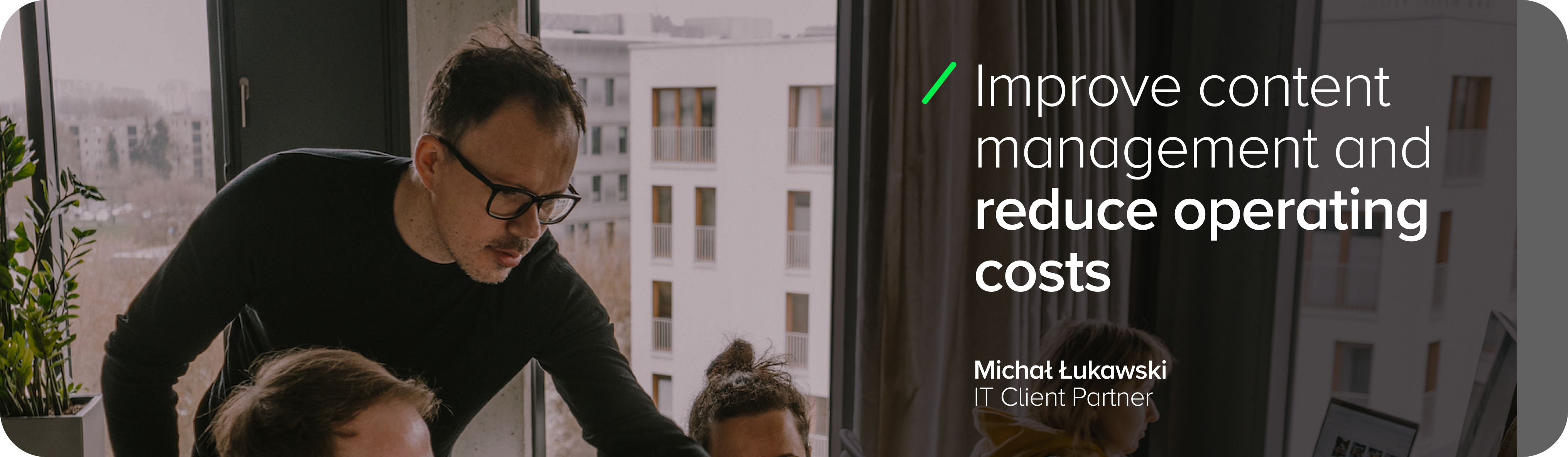 The image shows Michal Lukawski, IT Client Partner, discussing project details with the team. The graphic features the text: ‘Improve content management and reduce operational costs.’ The graphic highlights the need for pricing, how much it costs to make a website, implement a content management system and what analytical tools can support the optimisation of these processes.
